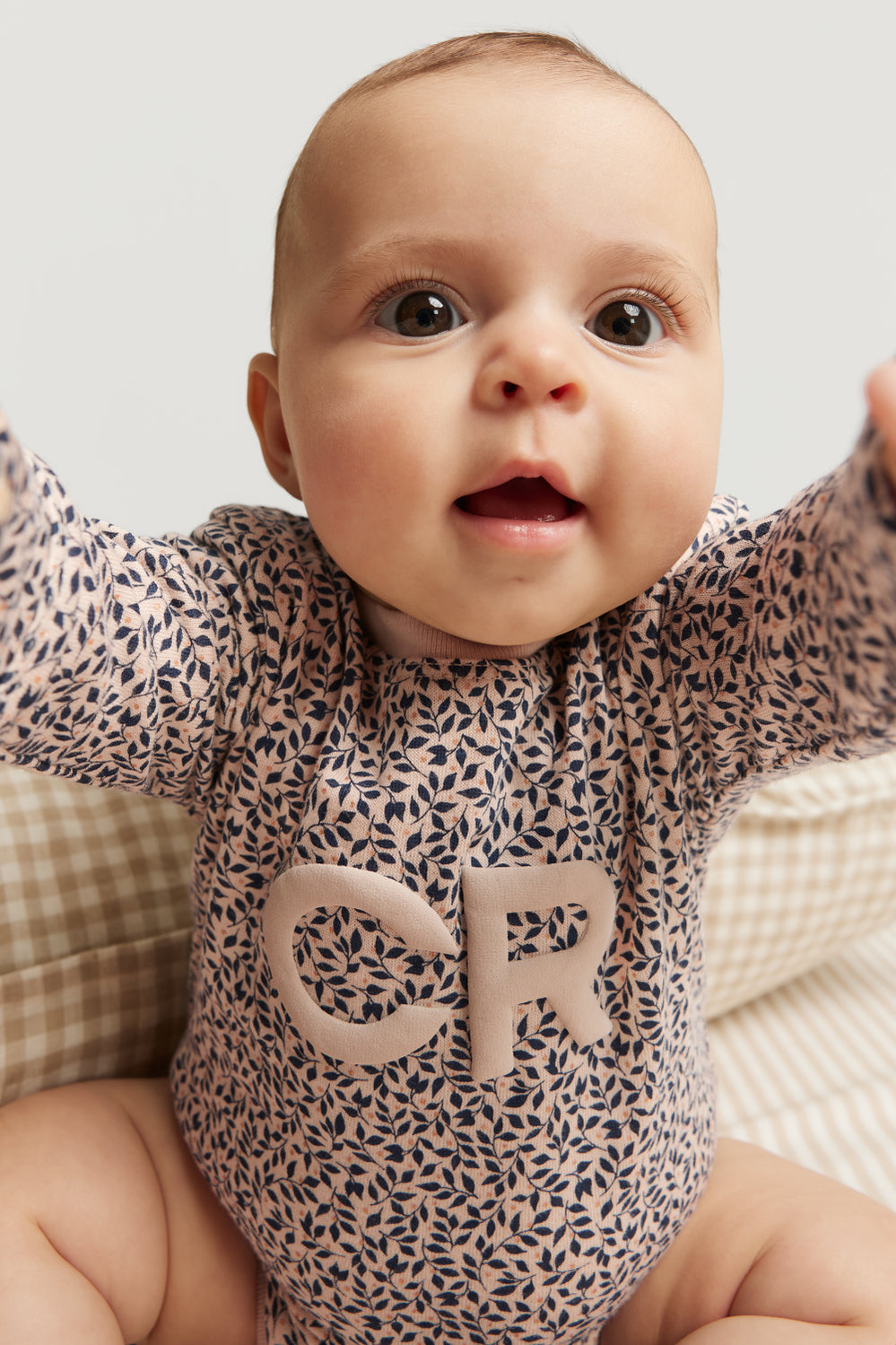 Organically Grown Cotton Puff Logo Long Sleeve Bodysuit