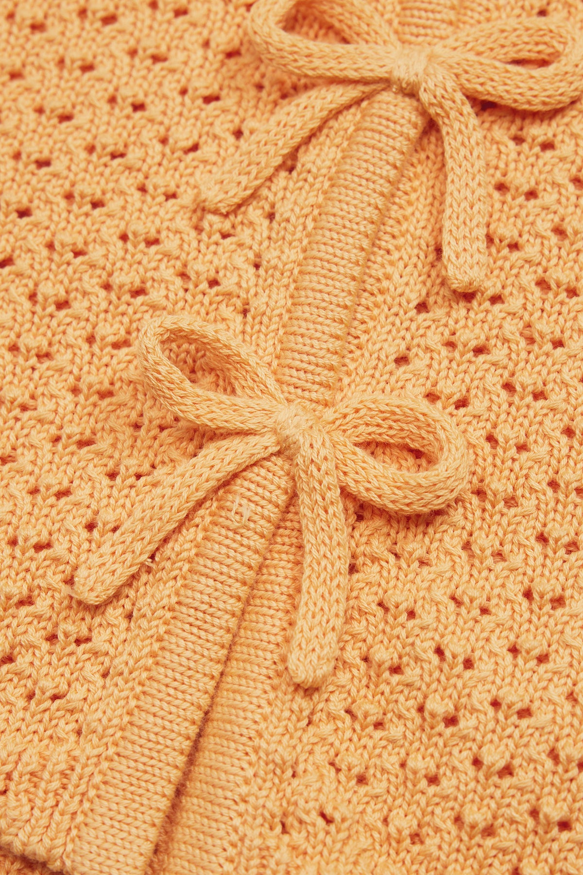 Sleeveless Scallop Knit Top